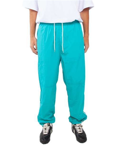 Shaka Wear Unisex Nylon Track Pants - Model Front